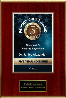 A plaque that says patients choice award wisconsin 's favorite physicians dr. Janice alexander five year honoree